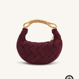Elegant Burgundy Woven Handbag with Gold Accents